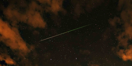Perseid meteor with coulds